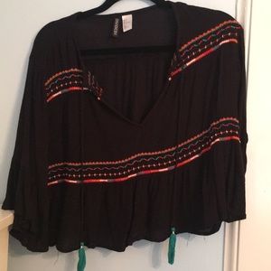 Black crop top with colorful design